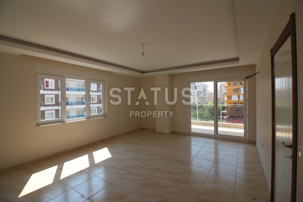 Новые апартаменты  в новом комплексе в самом центре Махмутлара. Большие площади и маленькие цены! 80 кв.м. фото 23