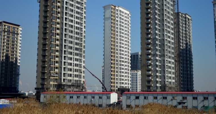 China's government keeps new home prices flat for the 1st time in 18 months