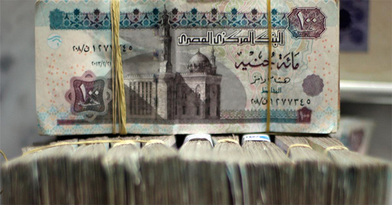 Egypt's credit rating lowered as its foreign exchange reserves dropped