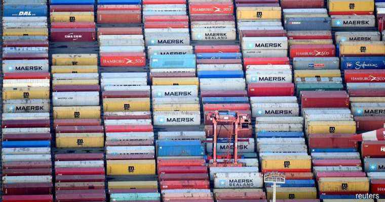Japan's exports hit biggest monthly record, fueled by China & U.S. sales