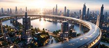 An elevated ring road curving around a city at dusk