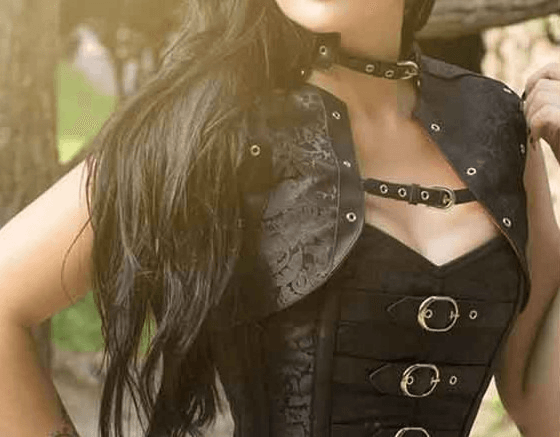 Alt text: Gothic black corset with buckles.