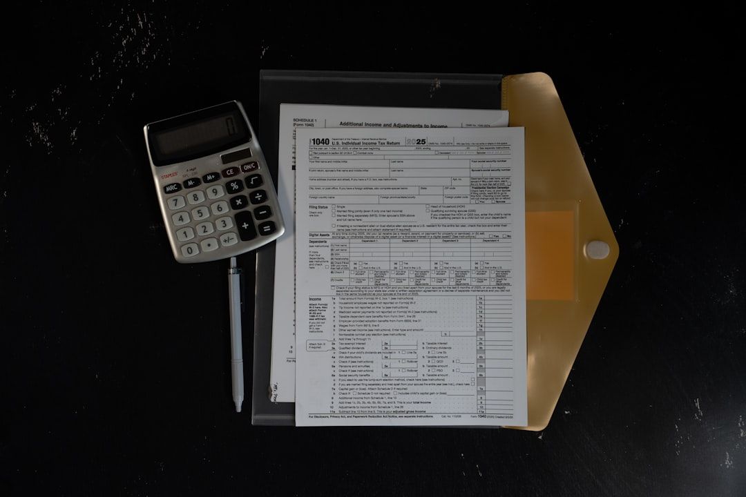 A close-up of a legal consultation with documents and a calculator on a table