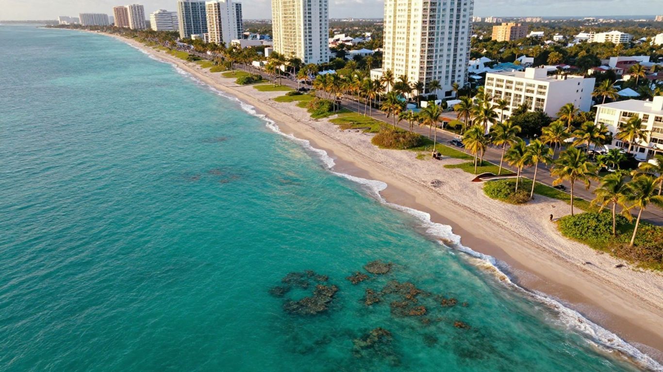 Florida coastline with beaches, palm trees, and distant cities.