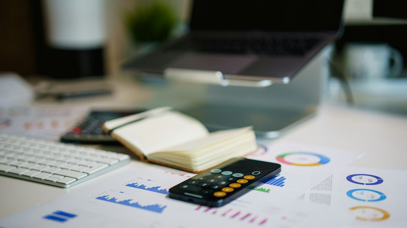 Detailed financial analysis on a bright desktop