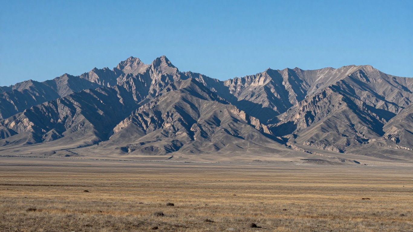Vast, rugged landscape of Wyoming with mountains and plains.