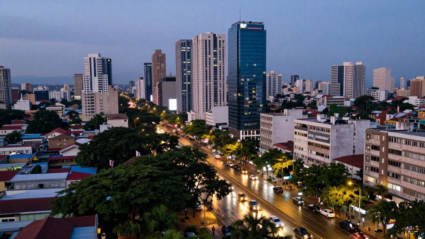 African city skyline with skyscrapers and busy streets at dusk.