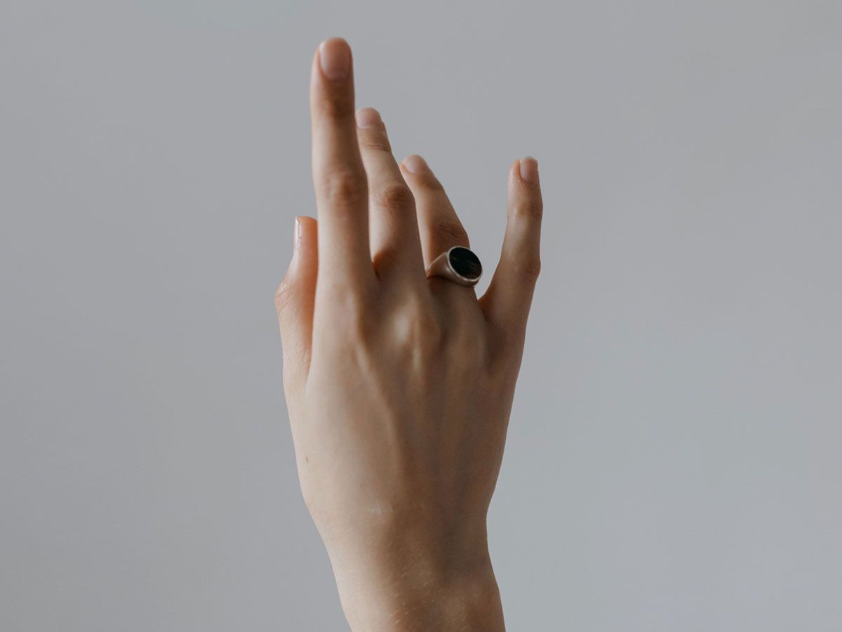 signet ring on ring finger 