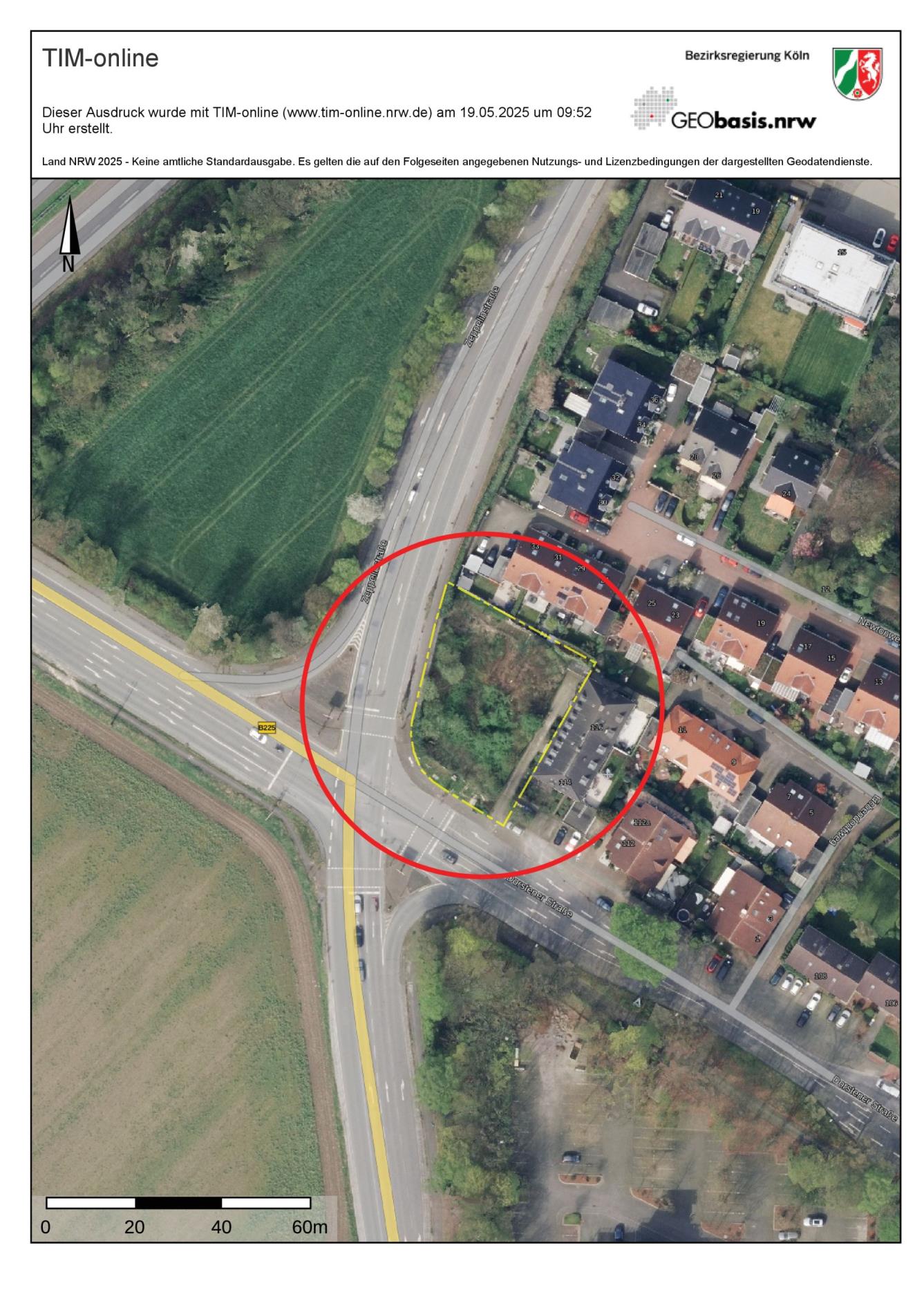 Luftbildansicht des unbebauten Grundstücks Gudrunstraße 1a in 45770 Marl, umrandet mit rotem Kreis, im Bereich einer Straßenkreuzung mit angrenzenden Wohnhäusern und Grünflächen